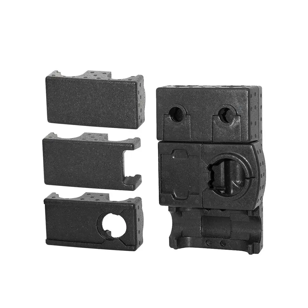 Isolierbauteile in Schwarz, gehören zur GSP930-Serie, verwendet in ESBE Pumpengruppen DN20, bestehen aus mehreren separaten Elementen.